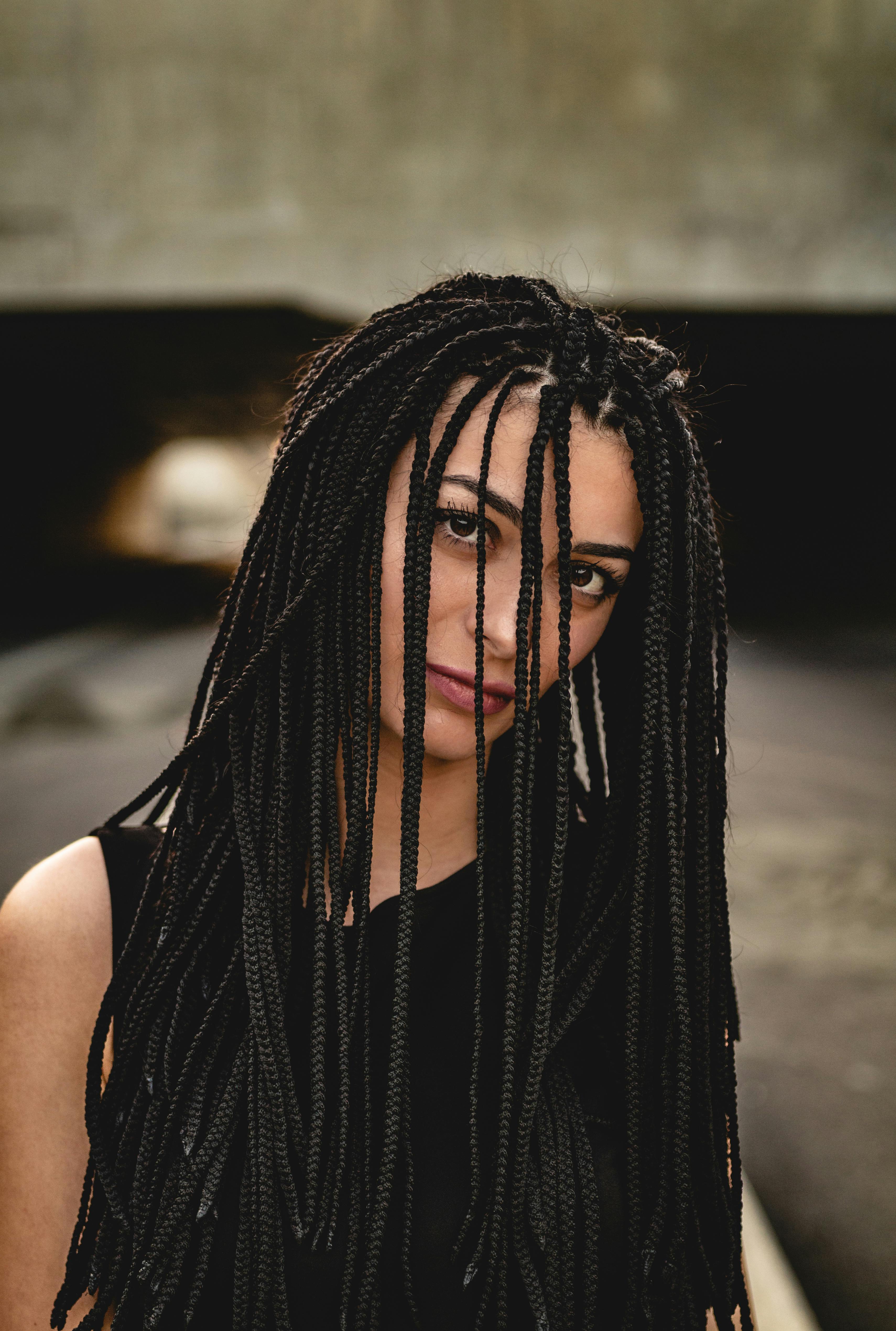 Single braids in Table View and Blouberg